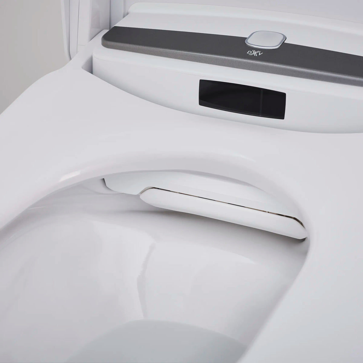 AT200®LS Dual Flush Elongated SpaLet® Bidet Toilet // CANVAS WHITE // 289920_L-D29030CS416415_AutomaticNozzleShutterClosed_0_CDNwebp.webp